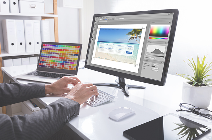 Designer on Desktop Computer